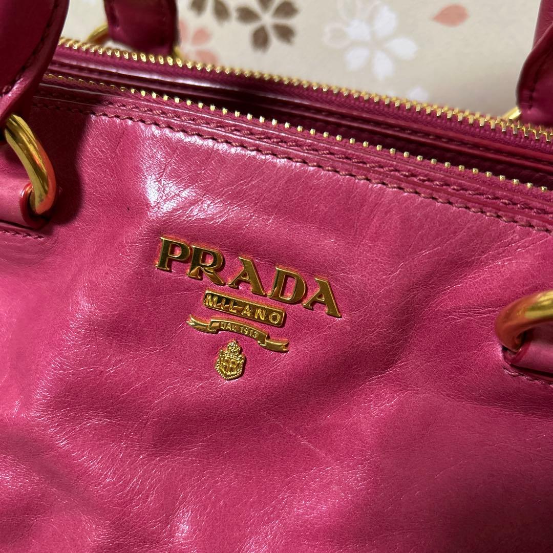 プラダPRADA ピンク レザートートバッグ斜め掛け紐付き