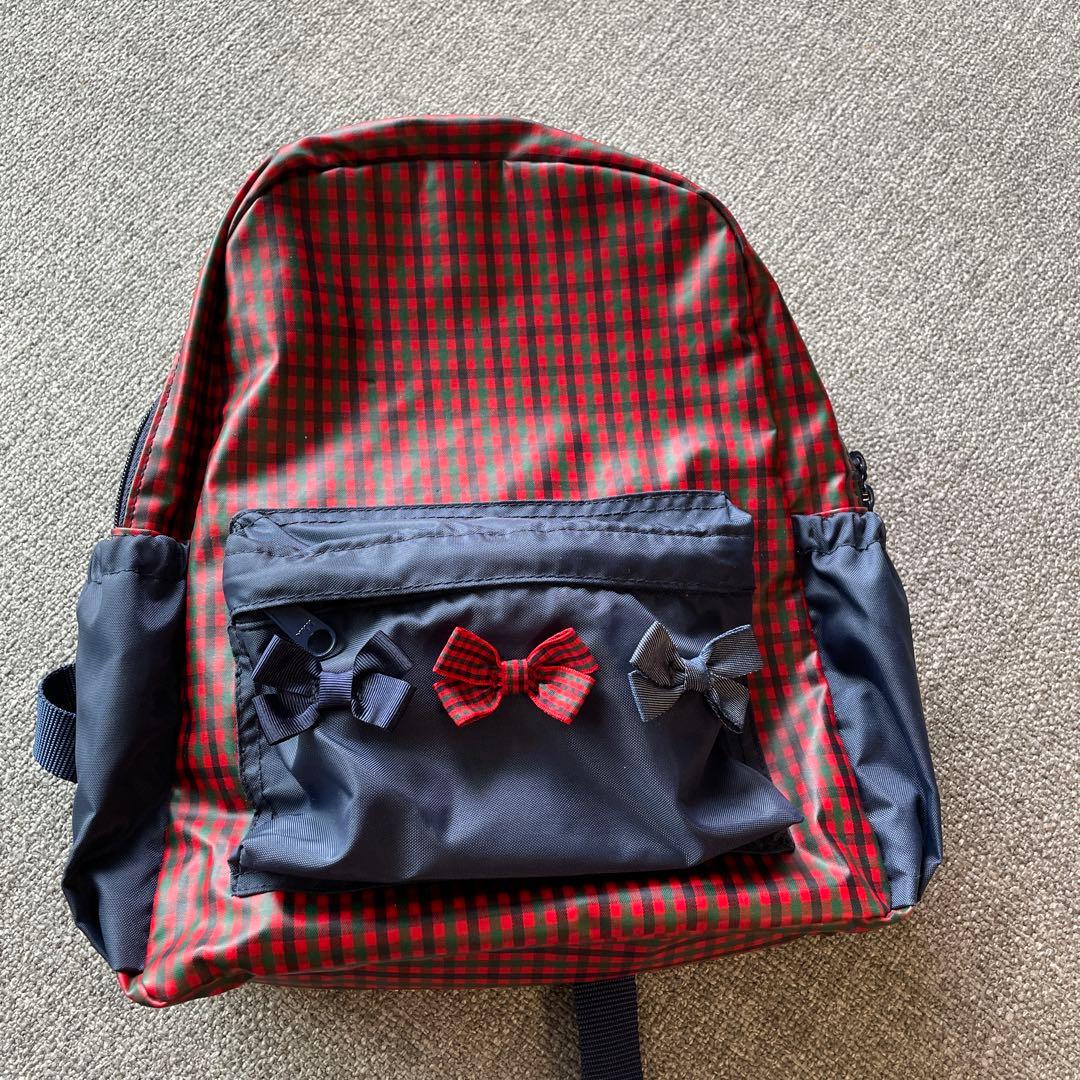 ファミリア　リボン付き赤黒チェックリュック