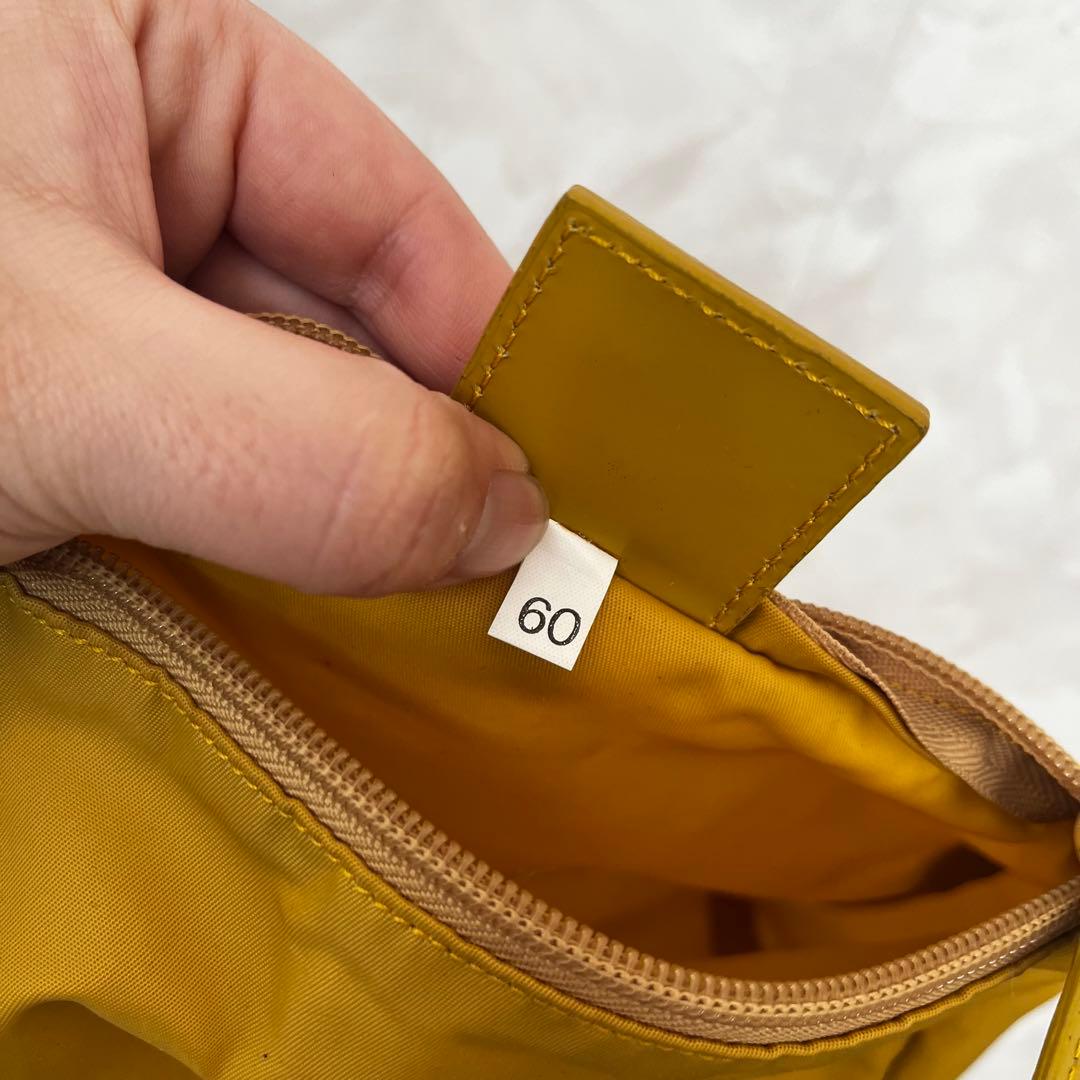 PRADA プラダ 三角プレート テスート ナイロン メイクポーチ イエロー