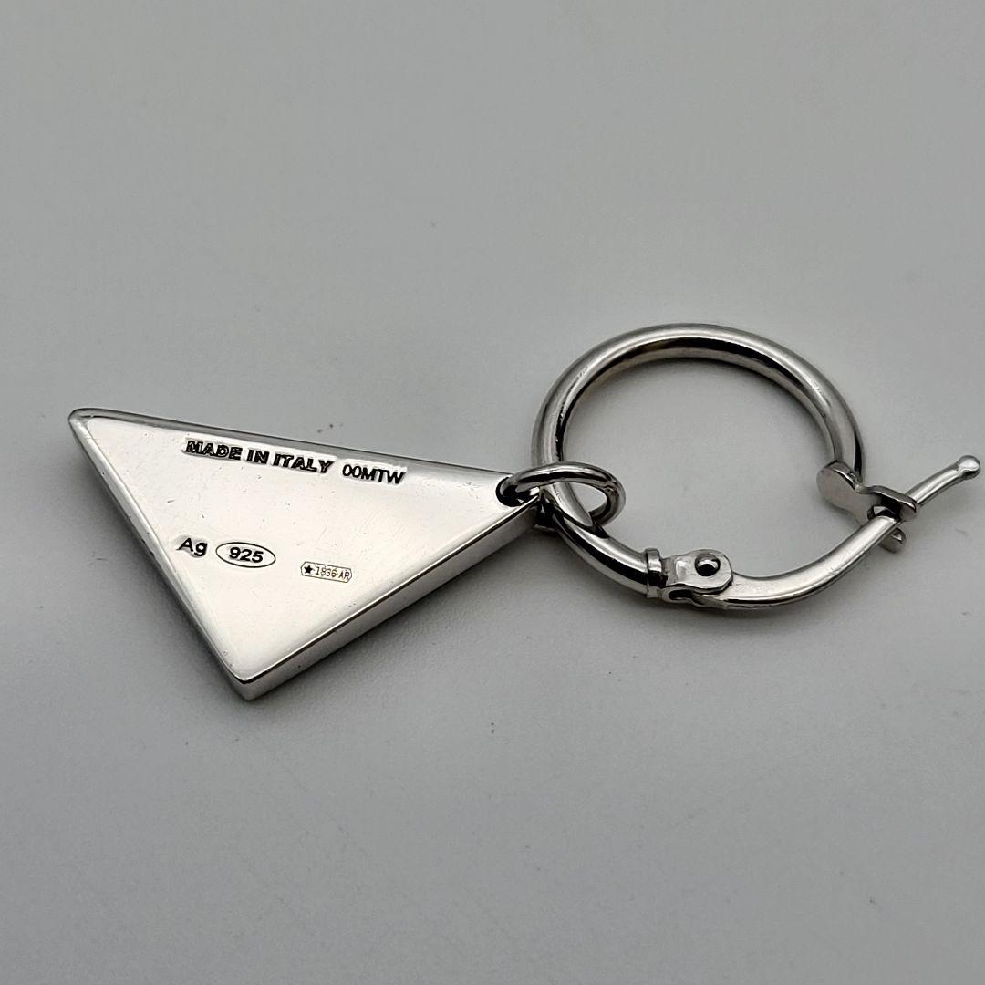 PRADA シルバー 三角形ピアス(片耳用) クリスタルロゴ ジュエル