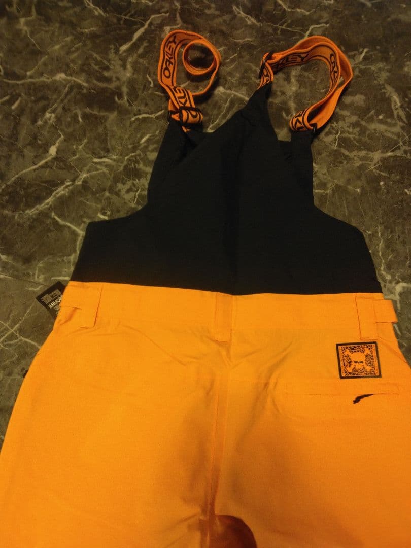 OAKLEY スノーボードウェア XL オレンジ 10K