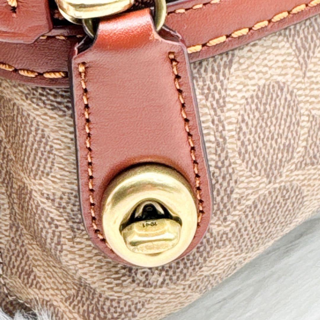 美品✨ COACH PVC レザー ターンロック シグネチャーミニリュック