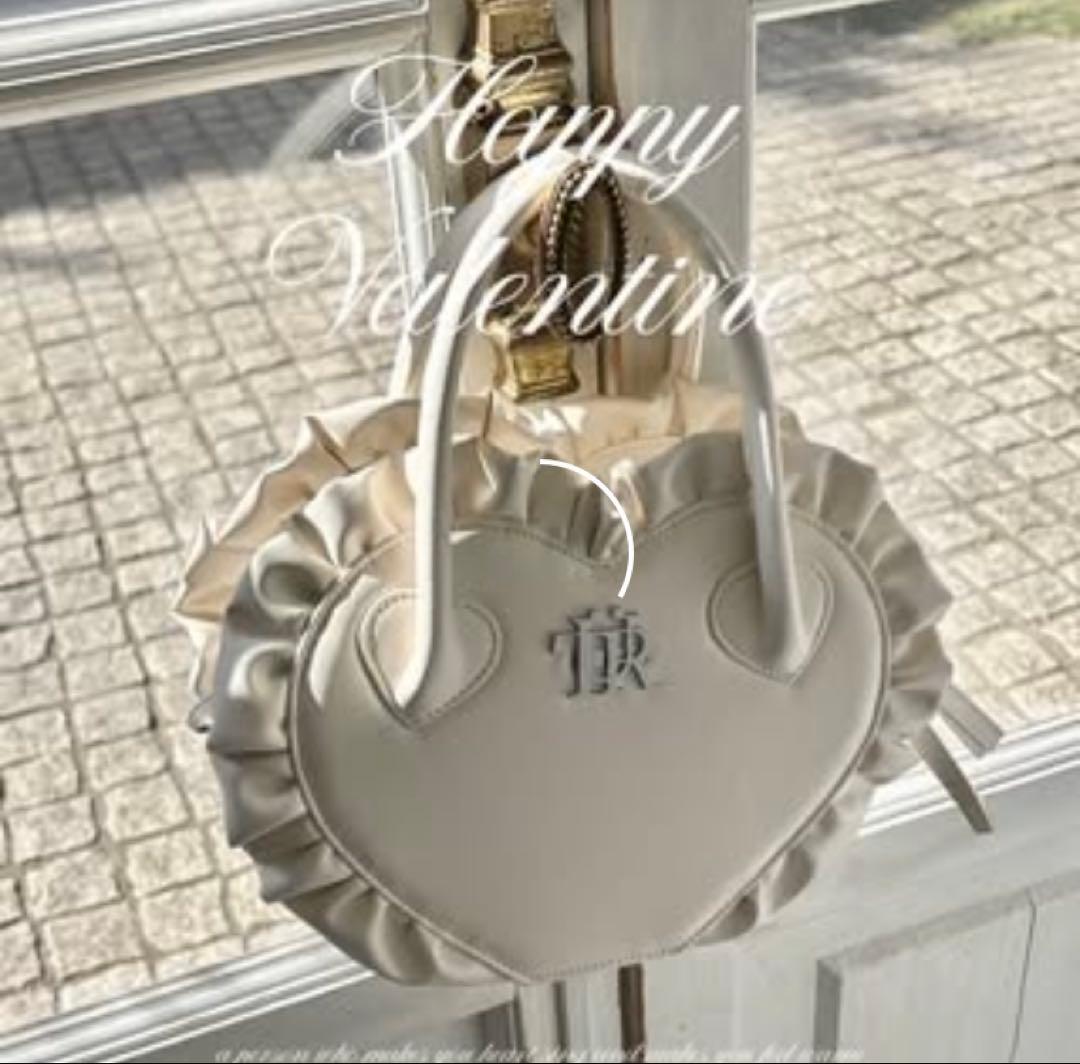 バッグ Treat Urself original leather heart bag.