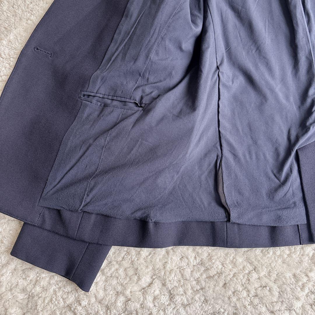 プラステ ノーカラーパンツスーツ ブラッシュドバック S/XS ネイビー