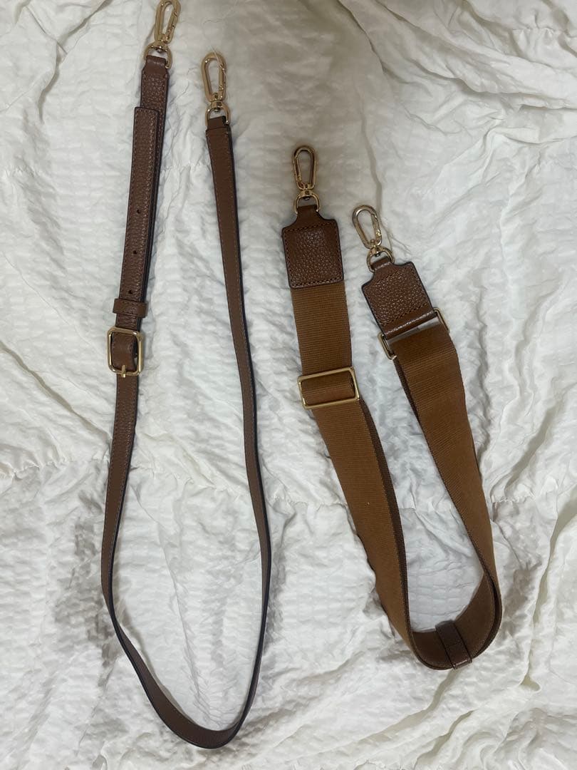 な*ぺ様 ブラウンレザー ハンドバッグ タッセル付き